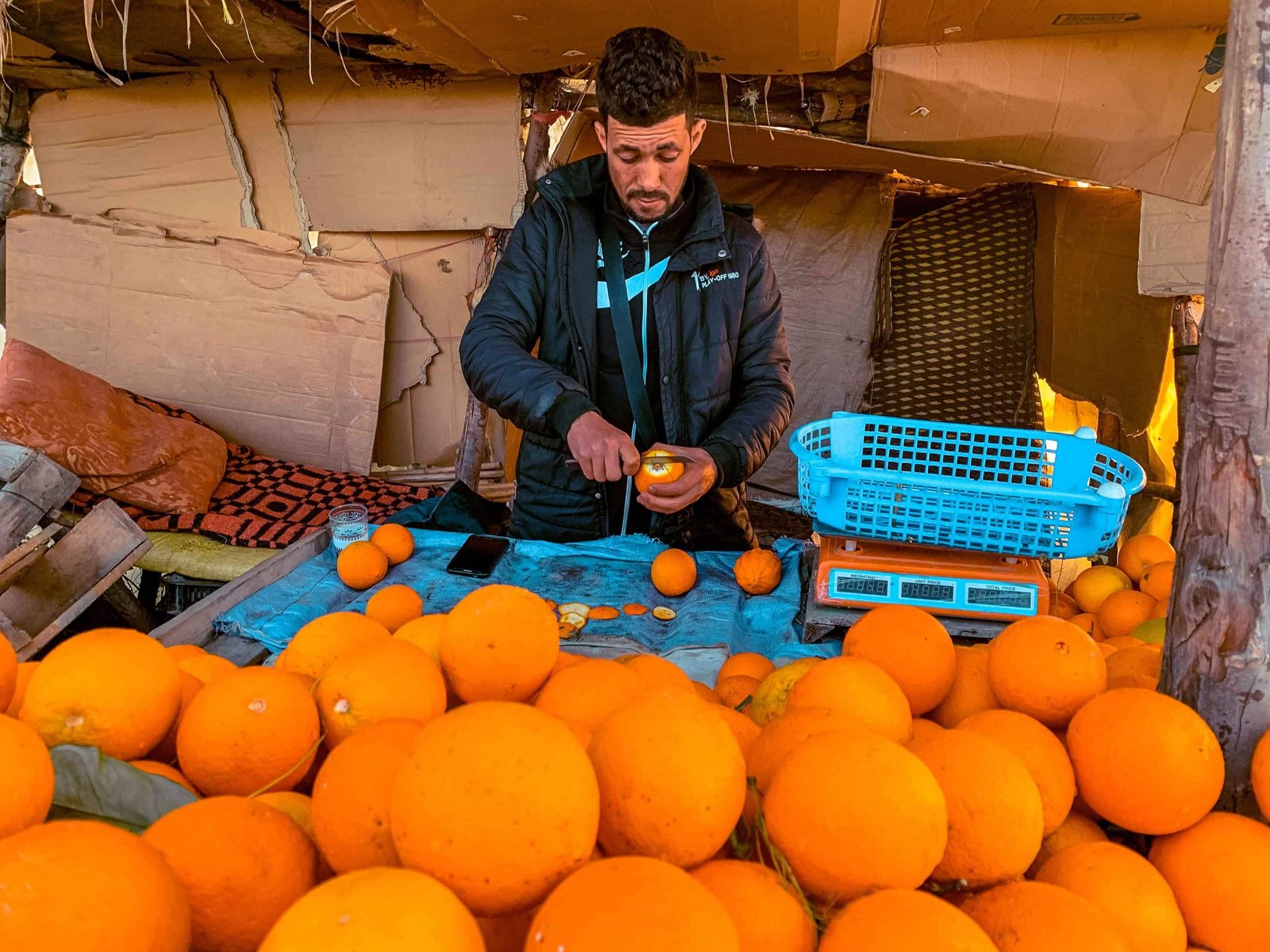 Orange vendor Chefchaouen