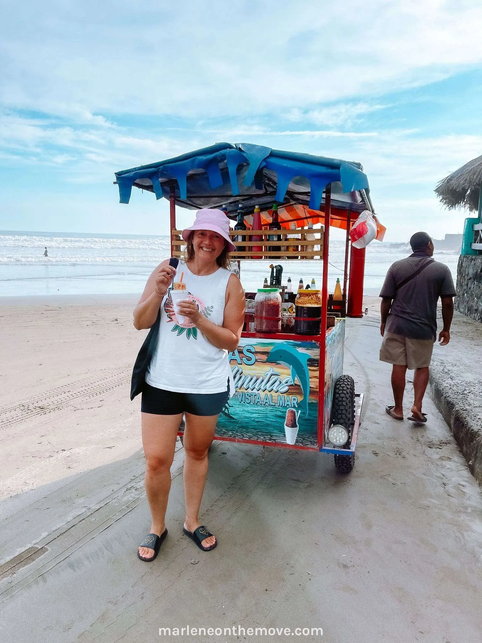Tasting a Minuta in El Cuco beach in El Salvador