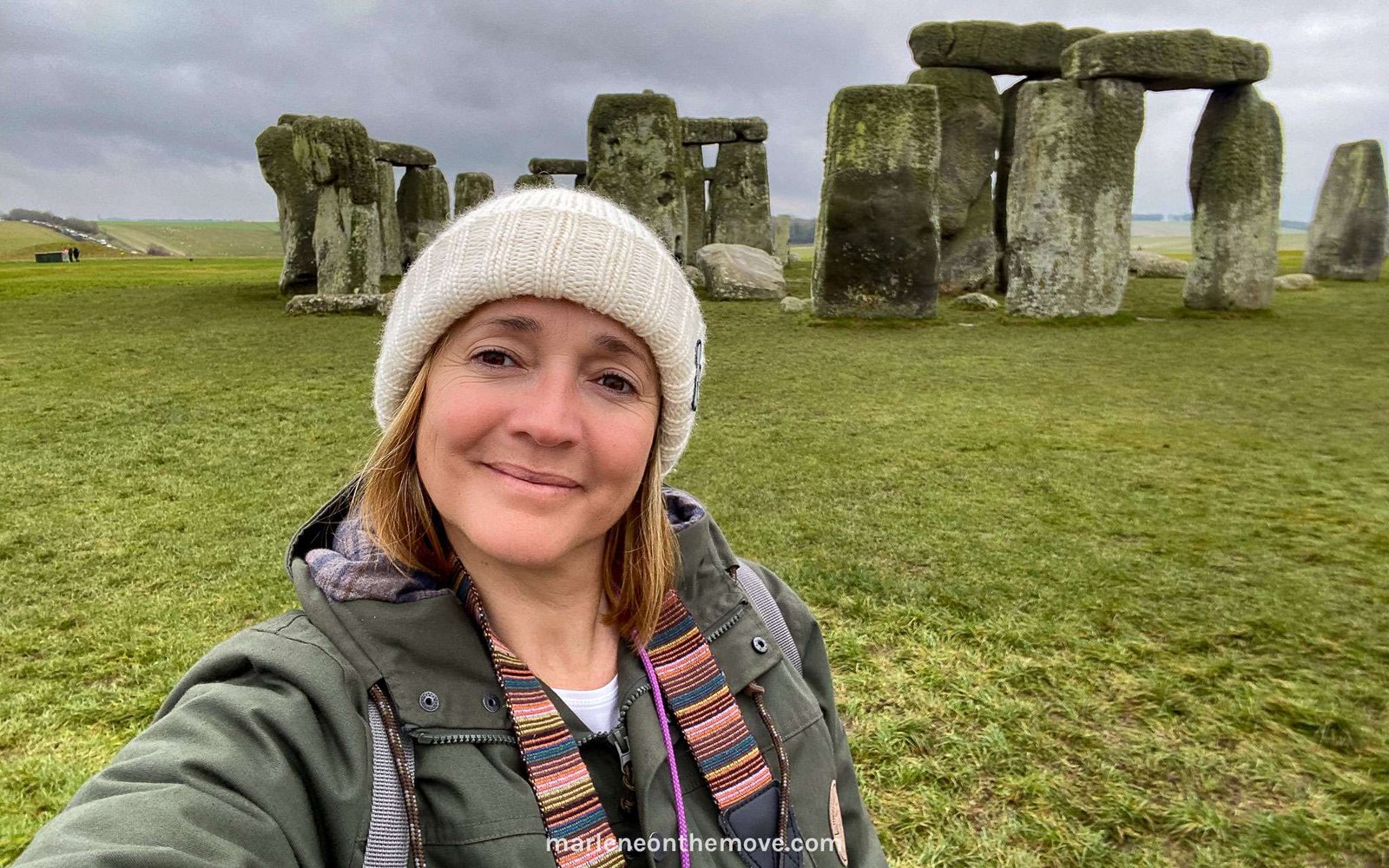 Marlene On The Move at Stonehenge. Here's the best tips for visiting Stonehenge during the Winter Solstice.