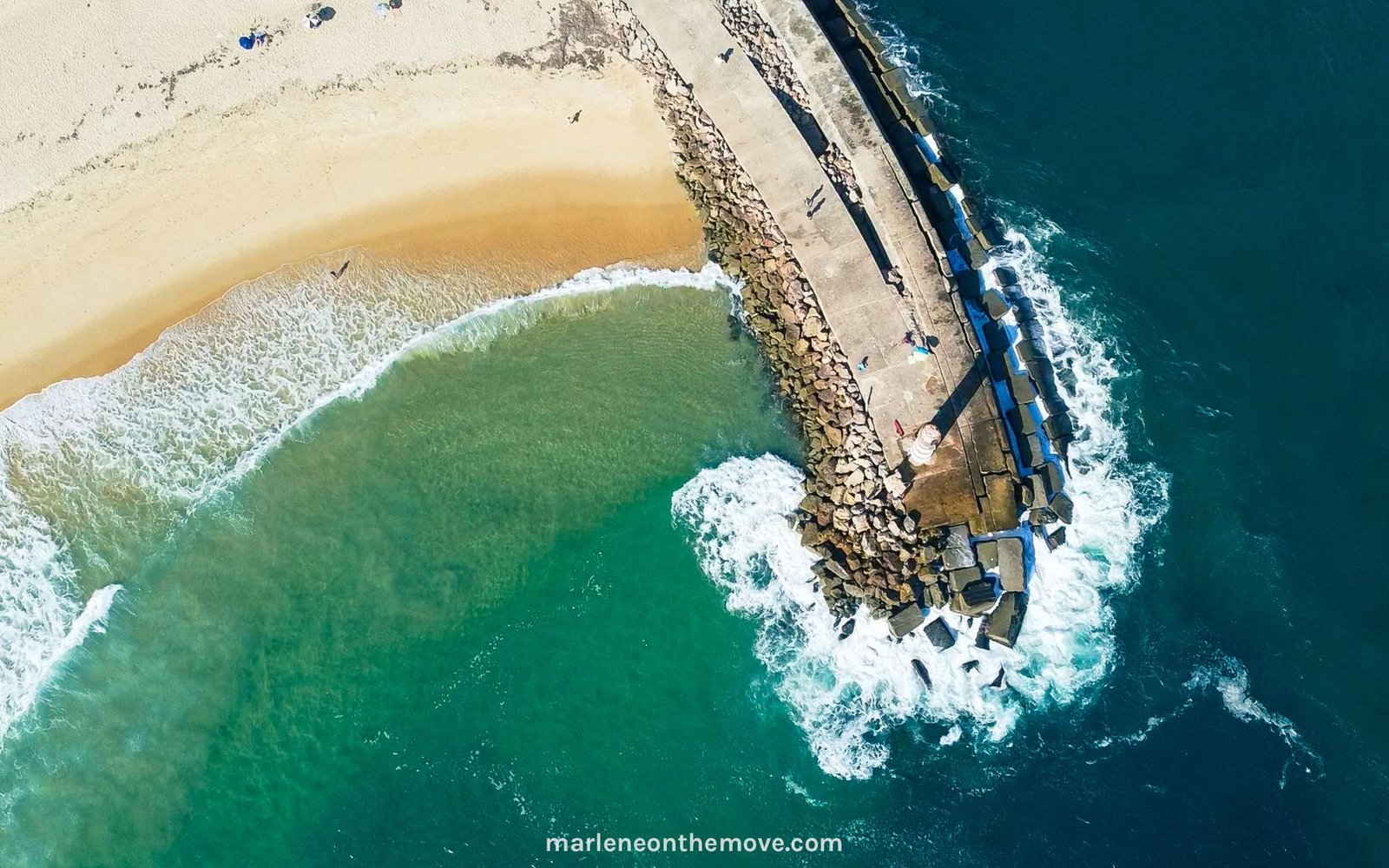 Aerial look over the lighthouse in Deserta island, in Algarve