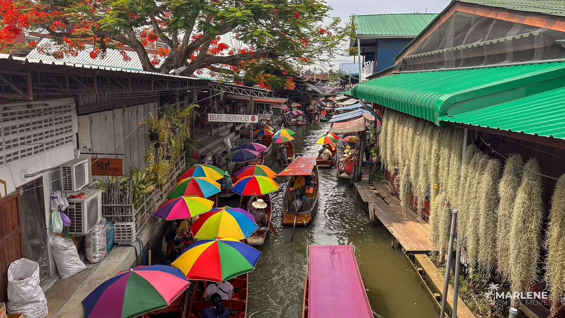Traditional Thai boats docked in the floating market