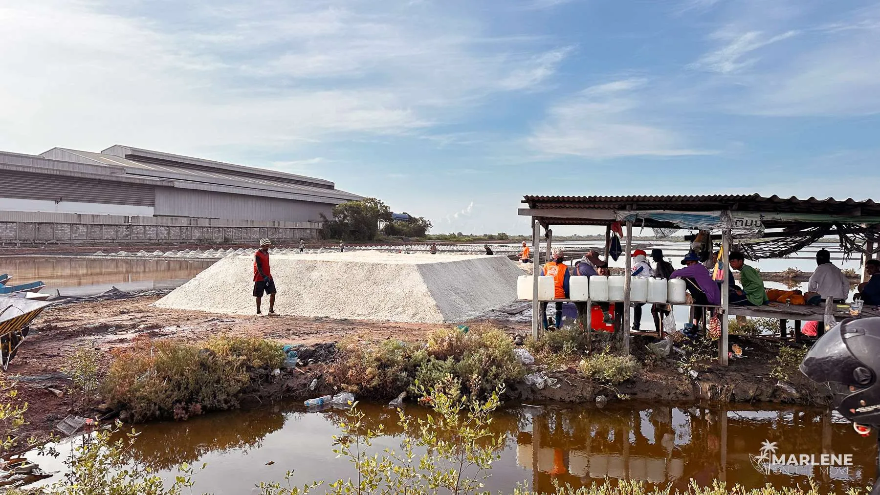 Salt fields along the roadside on the way to Maeklong and Damnoen Saduak markets
