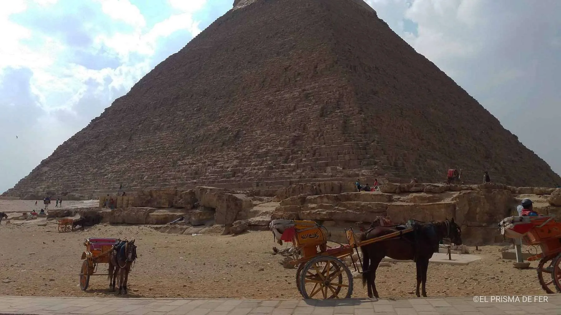 Carriages parked near one of the Pyramids of Giza in Egypt