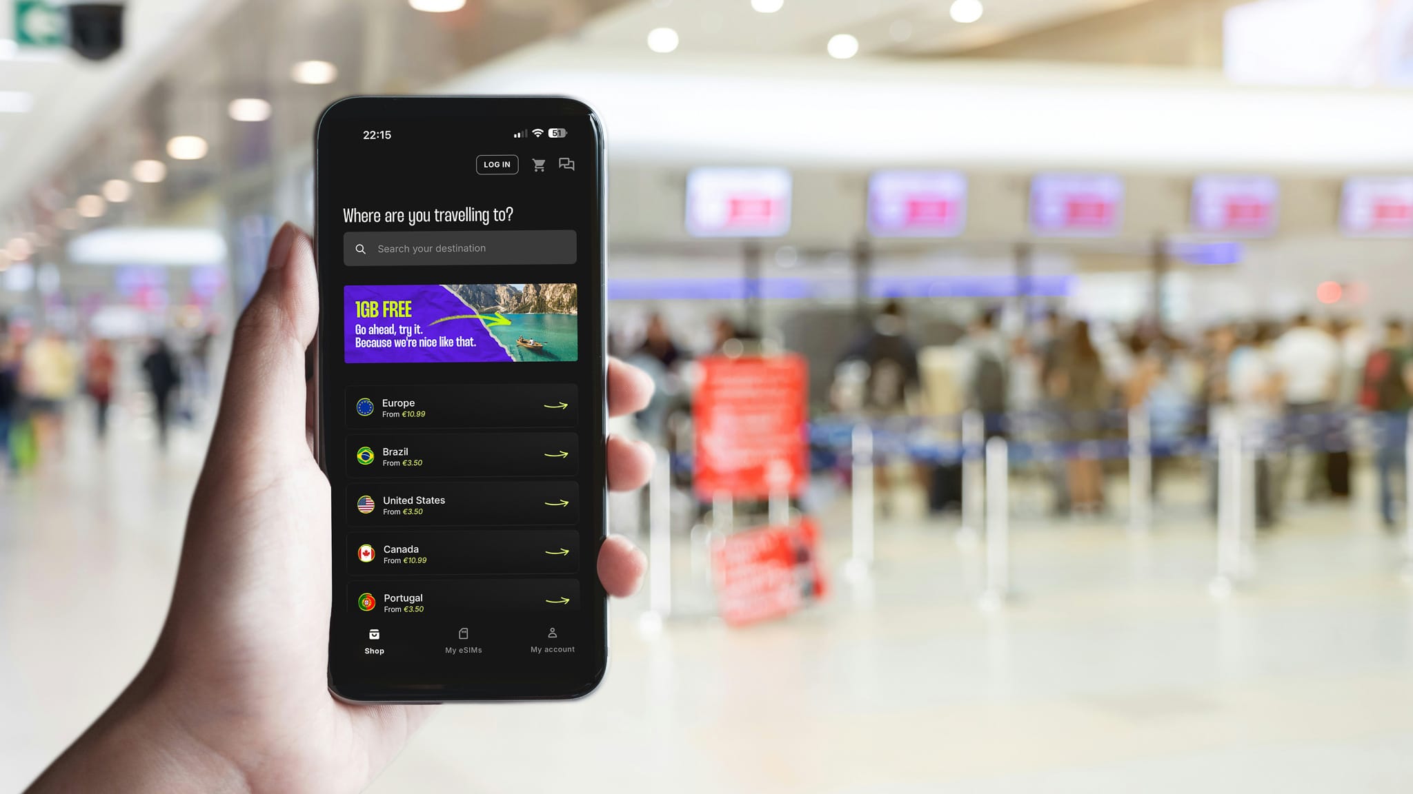 The get travel eSIM app home screen on a phone, with an airport check-in area behind