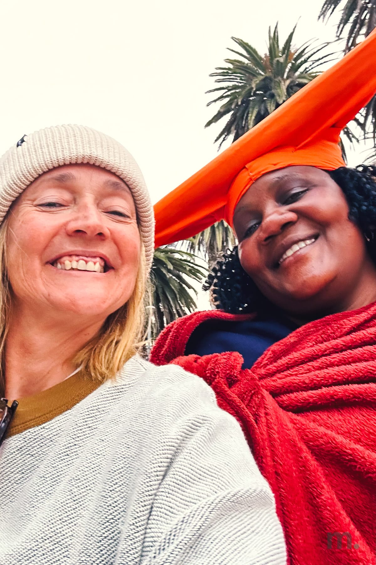 Marlene with a Herero woman in traditional dress and otjikaiva headdress in Swakopmund